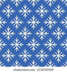 Patrón inconsútil de las Navidades del invierno con los copos de nieve blancos en el fondo azul