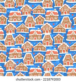 Seamless winter gingerbread pattern. Christmas snow houses on blue background. New year holiday gift wrapping paper. Kids and home textile. Book cover. Scrapbooking