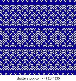 Seamless winter New Years pattern. Blue and white knitted christmas background. Vector