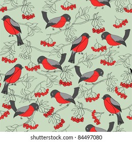 Seamless winter pattern with bullfinches and rowan