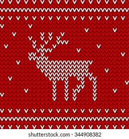 Seamless winter pattern with christmas deer. Red and white knitted background