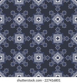 Seamless winter pattern with geometric snowflakes.