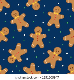 Seamless winter pattern with gingerbread man on dark blue background. Vector flat illustration 