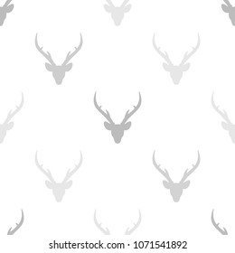 seamless winter pattern with  grey silhouette of deer head with antlers. vector flat Christmas ornament on white background