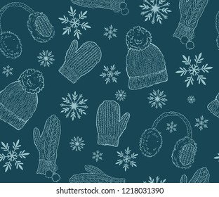 Seamless winter pattern. Knitted hats and mittens on a blue background. Hand drawing, sketch
