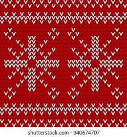 Seamless winter pattern. Red and white knitted background