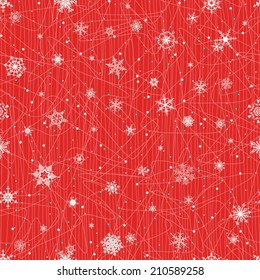 Seamless winter pattern with silver snowflakes on a red background