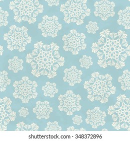 Seamless winter pattern with snowflakes. Christmas background