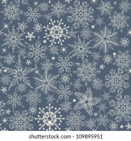 seamless winter pattern with  snowflakes on blue background