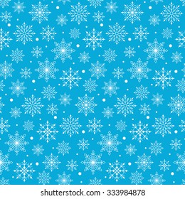 Seamless Winter Snow Flakes Background Pattern in Blue Color. Continuous Vector Illustration
