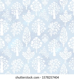 Seamless winter wonderland pattern. Frozen forest ornamental background. Vector illustration.