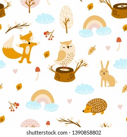 Seamless woodland pattern with cute bear, owl, fox and hand drawn elements. Scandinavian style childish texture for fabric, textile, apparel, nursery decoration. Vector illustration