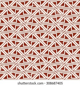 Seamless worn out aboriginal triangle geometry pattern background.
Seamless background image of vintage worn out red triangle aboriginal pattern.
