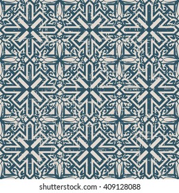 Seamless worn out antique background image of spiral cross geometry