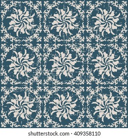 Seamless worn out antique background image of round spiral vine kaleidoscope