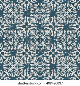 Seamless worn out antique background image of round curve geometry kaleidoscope