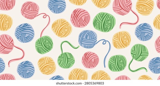 Seamless yarn pattern with colorful wool balls on a beige background. Cozy knitting illustration for handmade, crochet, sewing, textile, fabric, wallpaper, wrapping paper and DIY craft projects. 100% hand drawn vector file.