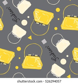 Seamless yellow bags pattern on gray background