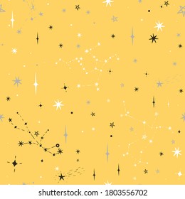 Seamless yellow pattern with black, gray and white stars. Vector graphics.