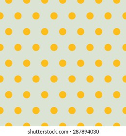 Seamless yellow polka dots on green background.