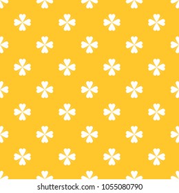 Seamless yellow and white four leaf clover textile pattern vector