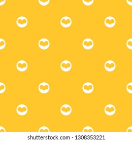 Seamless yellow and white polka dot with hearts pattern vector