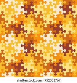 Seamless (you see 4 tiles) jigsaw puzzle pattern, background, print, swatch or wallpaper with whimsically shaped pieces of autumn or camouflage colors