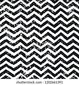 Seamless zig zag stripped pattern. Monochrome black and white colors, grunge texture. Horizontal lines. Vector illustration isolated on white background.