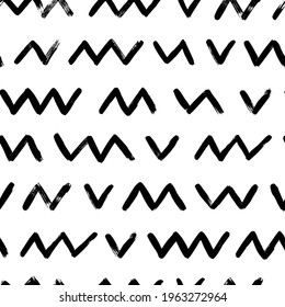 Seamless zig zag vector pattern. Abstract monochrome geometric brush strokes. Black and white hand painted ink illustration. Freehand horizontal zigzag stripes print. Simple classic geometric ornament