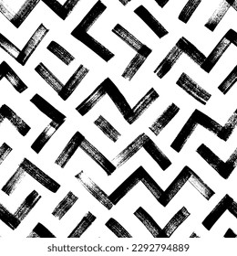 Seamless zigzag lines pattern. Brush drawn bold zig zag stripes. Geometric chevron abstract wallpaper. Tribal ethnic vector texture. Aztec geometric motif. Abstract modern ornament.