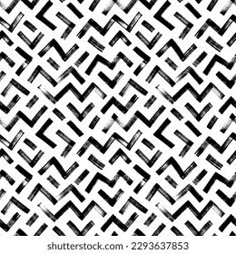 Motif harmonieux de lignes de zigzag. Brosse dessinée à l'effigie en zag. Fond d'écran abstrait chevron géométrique. Texture vectorielle ethnique tribale. Motif géométrique aztèque. Décor abstrait moderne.