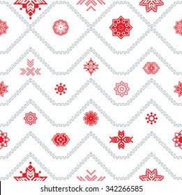 Seamless zigzag and red solar symbols. Ethnic pattern.