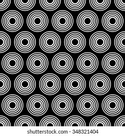 Seamlessly repeatable pattern with concentric circles. Black and white background.