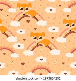 Seamlesss pattern with boho style fox and rainbows on light orange background for kids bedding or textile