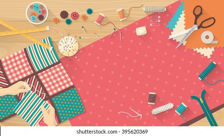 Seamstress working with quilting fabric, sewing equipment and fabric on a wooden worktop, sewing, hobby and creativity concept