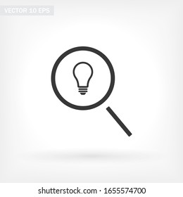 Icono de la luz de búsqueda. Vector Eps 10. lupa de búsqueda, bombilla interior insertada Diseño plano.