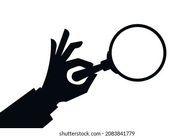 Searching concepts with male hand using magnifying glass on white background