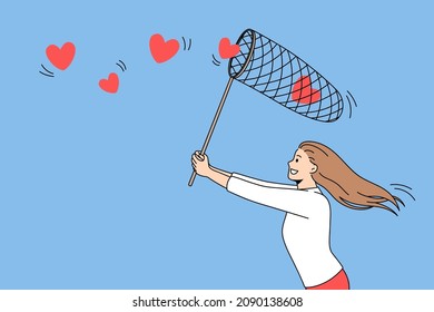 Searching for love and romance concept. Young positive girl running trying to collect flying red hearts in net over blue air background vector illustration 