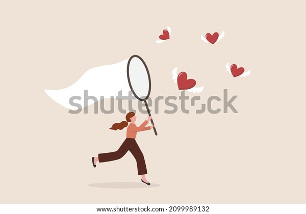 Searching for passion, motivation or work
inspiration, finding relationship, romance dating, desire or
aspiration concept, business woman using butterfly net to catch
flying passionate lovely
heart.