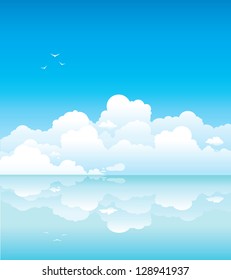 Seascape - white clouds with birds and calm sea