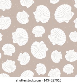 Seashells, scallop, white on sandy, cappuccino colour beach. Vector seamless pattern.