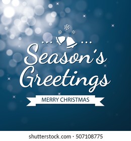 Season greetings with blue bokeh defocused background