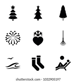 Season icons. set of 9 editable filled season icons such as socks, rake, heart frozen, christmas tree, fireworks, man laying in the sun, sea and gull, christmas tree