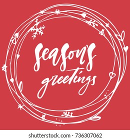 Season s Greetings - hand lettering Christmas and New Year holiday calligraphy phrase isolated on the background. Brush ink typography for photo overlays, t-shirt print, poster design.