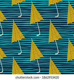 Season seamless rainy pattern with yellow umbrella silhouettes. Blue striped background. Decorative backdrop for fabric design, textile print, wrapping, cover. Vector illustration.