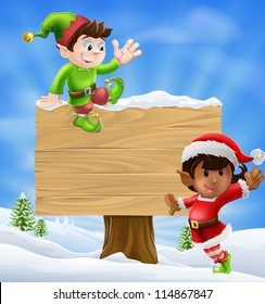 Seasonal cartoon of two Christmas elves and a sign in the snow with Christmas trees in the background.