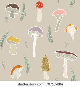 Seasonal and fun pattern featuring mushrooms, plant branches and pine needles in pastel colors. Isolated elements on a nude/beige background.
