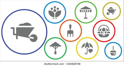 seasonal icon set. 9 filled seasonal icons.  Collection Of - Wheelbarrow, Blossom, Umbrella, Rake, Easter egg, Caramelized apple