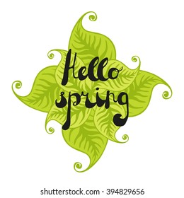 Seasons greeting card. Hand drawn lettering "Hello Spring" placed on green leaves. Vector illustration. 