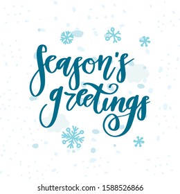 Season's Greetings! Beautiful hand written lettering, calligraphy Holiday text for greeting card, poster, banner for Christmas and New Year celebration